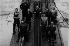My father’s in the centre sitting on the cables.