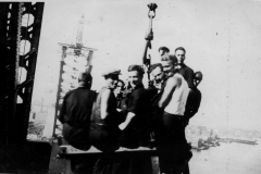 Off to work. If you missed the daily “ride” to the top it was a long walk. That’s my father second from the left, with the cap.